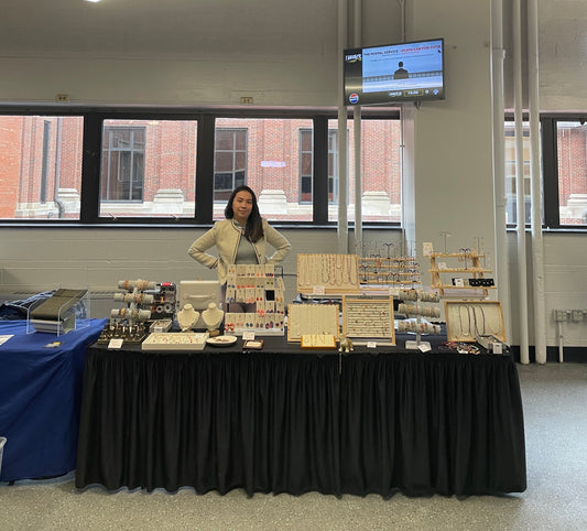 Image of Linny's Artsy Fingers® LLC booth at Milwaukee Wave game